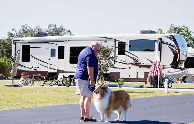 Man-With-Dog-Camper